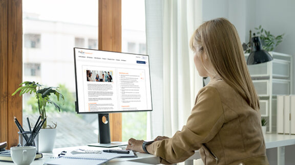 female using SOX compliance checklist on a desktop computer