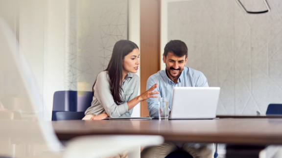 hr employees using on of the best cloud-based hr software systems on a computer