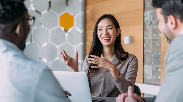 HR professionals using one of the best HRIS softwares