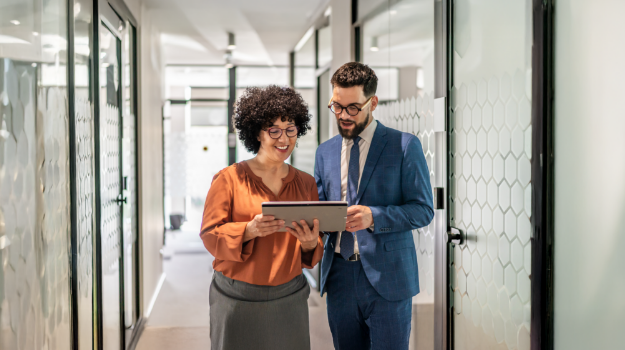 two HR leaders researching the best hr software systems