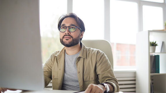 HR pro staring at computer