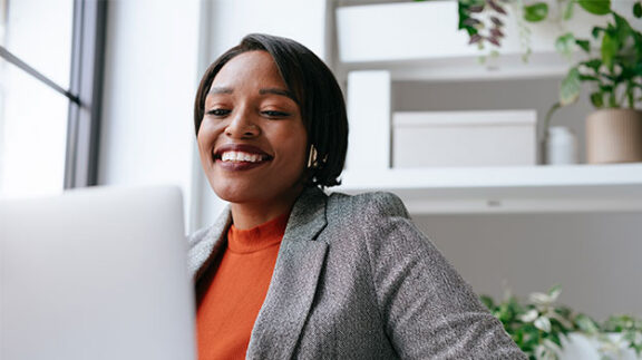 Payroll professional on laptop