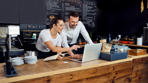 Restaurant Manager looking at computer