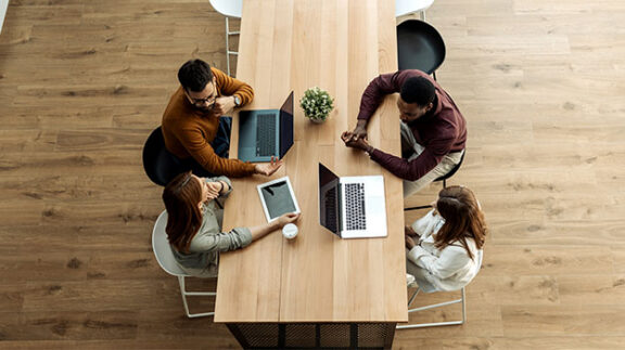 HR professionals on computers
