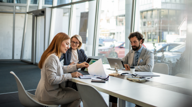 HR professionals reviewing documents
